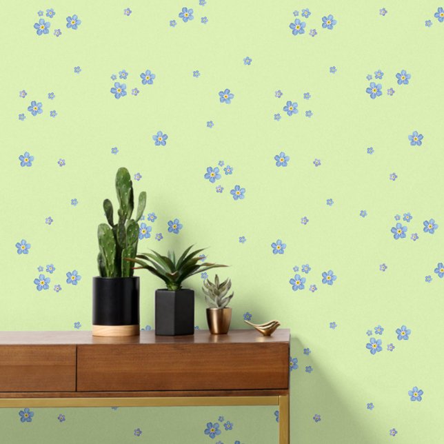 Blue watercolor forget-me-not flowers - green wallpaper (Eine romantische grüne Wandtapete mit einem Muster aus kleinen, hellblauen Vergissmeinnicht-Blüten)