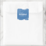Blue Watercolor Snowfall Hanukkah Snowy Holiday Square Sticker<br><div class="desc">Cute and stylish,  these stickers are perfect for your Hanukkah holiday gift-giving needs.  Features blue watercolor clouds and white bokeh and snow.  Change the white text to fit any holiday greeting as well as your family name and the year.</div>