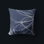 Blue & White Abstract Ribbon Design Cushion<br><div class="desc">Modern navy blue throw pillow features a stylish organic abstract design of white ribbons with dark navy blue accents on a blue background. A simple, trendy and elegant throw pillow for your bedroom, favourite chair, as an elegant addition in your family room or living room decor, or a thoughtful modern...</div>