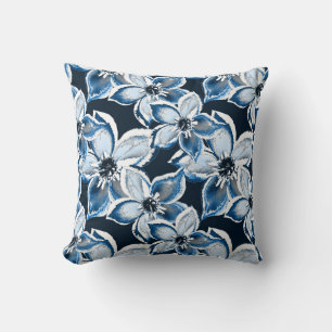 Blue, white flowers on a black background. Cushion