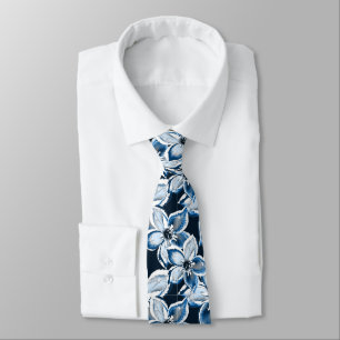 Blue, white flowers on a black background. Tie