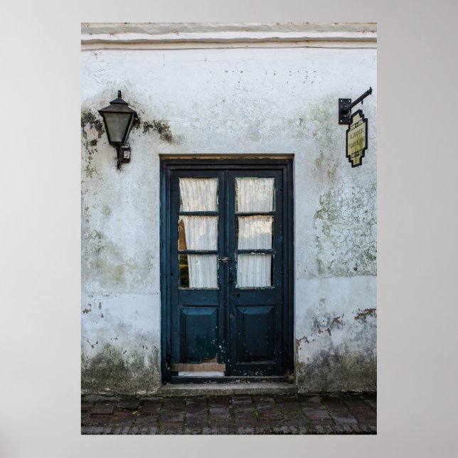 BLUE WOODEN DOOR PANEL IN WHITE BUILDING POSTER (Front)