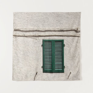 BLUE WOODEN WINDOW ON WHITE CONCRETE WALL TAPESTRY