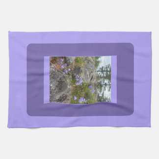 Bluebells on a rocky hillside  tea towel