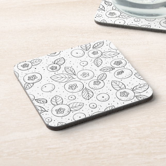 Blueberries on black and white coaster (Left Side)