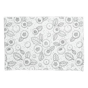 Blueberries on black and white pillowcase