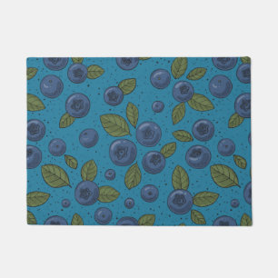Blueberries on blue doormat