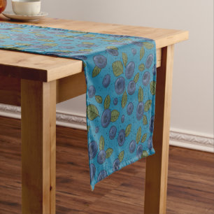 Blueberries on blue short table runner