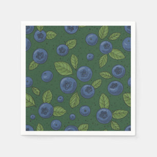 Blueberries on dark green napkin