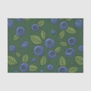 Blueberries on dark green tissue paper