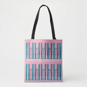 Blues skis on pink background tote bag