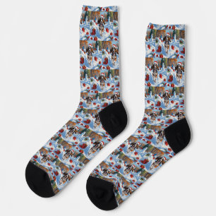 Bluetick Coonhound Running in Snow with Christmas Socks