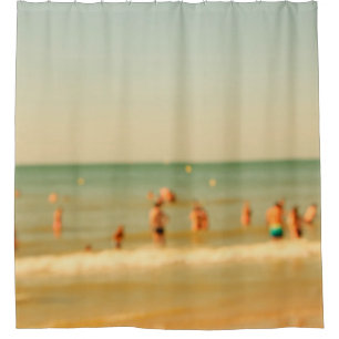 Blurred beach photo with bokeh. People relaxing on Shower Curtain
