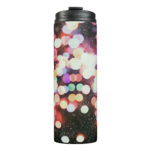 Blurred concert lights: defocused entertainment. thermal tumbler