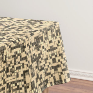 Blurred small squares or tiles, khaki or beige tablecloth