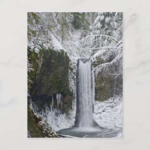 Blurry Waterfall Surrounded by a Snowy Forest Postcard