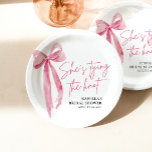 Blush Pink Bow She's Tying the Knot Bridal Shower Paper Plate<br><div class="desc">Elevate your bridal shower table setting with our Blush Pink Bow "She's Tying the Knot" Bridal Shower Paper Plates. Adorned with a charming pink bow design, these paper plates add a touch of elegance to your celebration. Serve up delicious treats and delights on these lovely plates, creating a memorable dining...</div>