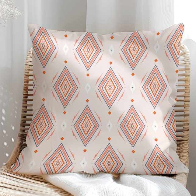 Blush Pink Burnt Orange Navajo Diamond Pattern Cushion (Pink Burnt Orange Navajo Diamond Shape Throw Pillow in a sunny rattan armchair)