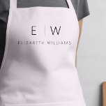 Blush Pink Elegant Minimalist Monogram Name Apron<br><div class="desc">Elevate your culinary experience with our Classic Elegant Modern Minimalist Monogram Name Cooking Apron. This kitchen essential seamlessly merges timeless elegance with contemporary minimalism. Crafted with precision, this apron is not just a practical accessory but also a statement of personal style. The customisable monogram and name option allows you to...</div>