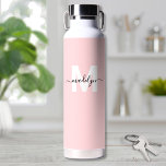 Blush Pink Modern Name Monogram Water Bottle<br><div class="desc">Create Your Own Personalised Blush Pink Name Monogram Water Bottle. This cute and stylish water bottle features a soft blush pink background with a bold white initial in the centre, overlaid by a flowing black script name for a personalised touch on both sides. Ideal for students, teachers, gym-goers, and fitness...</div>