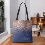 Blush Pink Rose Gold Navy Blue Glitter Monogram Tote Bag<br><div class="desc">Navy Blue,  Pink Rose Gold and Blush Pink Faux Sparkle and Glitter Elegant Monogram Book Bag. This Book Bag can be customised to include your initial and first name and given as a gift for Christmas,  Sweet 16 Birthday,  Bridal Shower or a Wedding.</div>