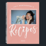 Blush Pink White Brush Script Recipes Photo Notebook<br><div class="desc">Photo recipe notebook,  perfect for bridal showers. In a charming blush pink and white design,  recipes is written in brush script beneath a photo of your choosing. A heart dots the i. Your photo fits into a frame of drawn white lines. Add name and year in modern letters.</div>
