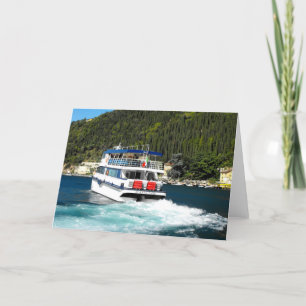 Boat leaving Maderno on Lake Garda in Italy Holiday Card