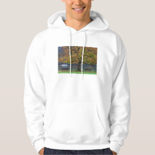 Boat on a lake in fall, Germany Hoodie