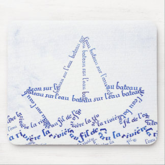 Boat on water mouse pad