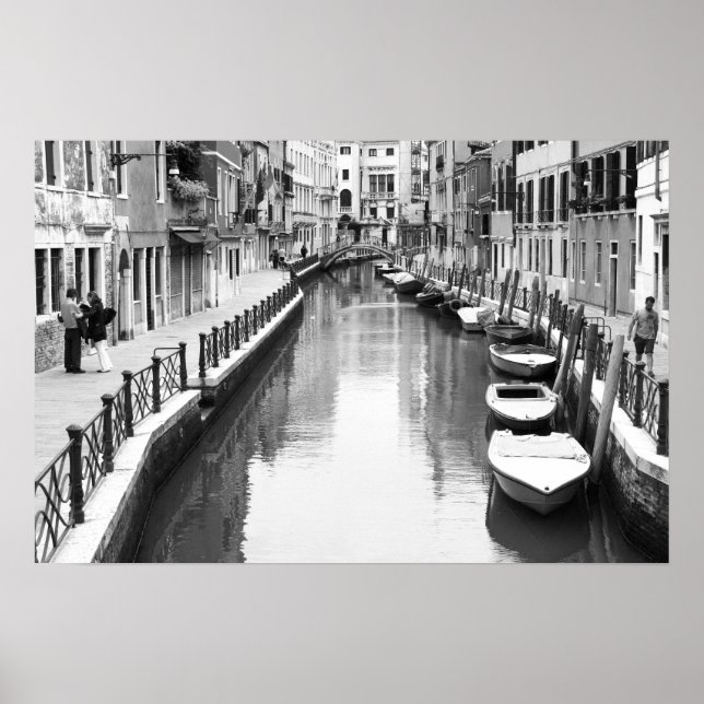 Boats along a canal in the Italian city of Venice Poster (Front)