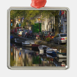 Boats and buildings along the canal belt, metal ornament