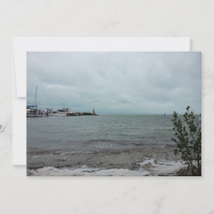 Boats and lighthouse on ocean landscape photo holiday card