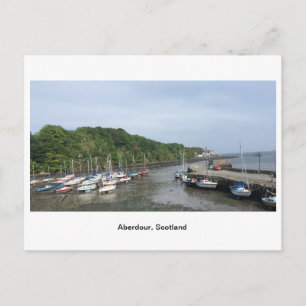 Boats in Aberdour harbour at low tide Postcard