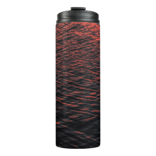 Body of water during sunset thermal tumbler