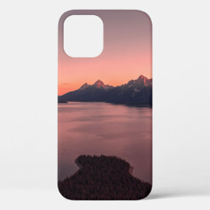 BODY OF WATER NEAR MOUNTAIN DURING SUNSET iPhone 12 CASE