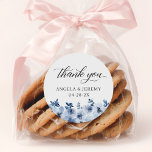 Bohemian Dusty Blue Floral Thank You Favour Classic Round Sticker<br><div class="desc">Add a touch of bohemian elegance to your wedding favours with these Bohemian Dusty Blue Floral Thank You Stickers! Featuring delicate dusty blue flowers, these stickers are perfect for adding a finishing touch to your wedding favours or thank you notes. And with Zazzle's design tool, you can easily customise these...</div>