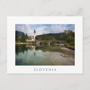 Bohinj lake with church in Slovenia white postcard