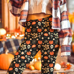Boho Halloween Floral Skull Cottagecore Leggings<br><div class="desc">Embrace the spirit of Halloween with these boho floral leggings, blending spooky skulls and pumpkins with a whimsical cottagecore aesthetic. Perfect for those who love unique holiday fashion, these leggings offer a stylish mix of cosy and edgy. Ideal for casual gatherings, Halloween parties, or festive autumn outings, these leggings combine...</div>