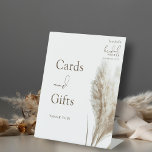 Boho Pampas Grass Bridal Shower Cards and Gifts Pedestal Sign<br><div class="desc">Boho Pampas Grass Bridal Shower Cards and Gifts Pedestal Sign. Guide your guests with style using this Boho Pampas Grass Bridal Shower Cards and Gifts Pedestal Sign, set against a clean white backdrop. Perfect for your bohemian-themed celebration, this sign features a soft and neutral earthy colour tone that stands out...</div>