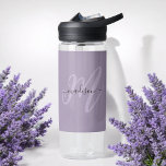 Boho Stylish Script Monogram and Name in Purple Water Bottle<br><div class="desc">So stylish and feminine this custom water bottle has boho chic lettering featuring your monogram initial in large modern font in lavender with your name in a black handwritten font over a purple background. The look is modern and attractive and all about you! Personalise with your name and initial. When...</div>