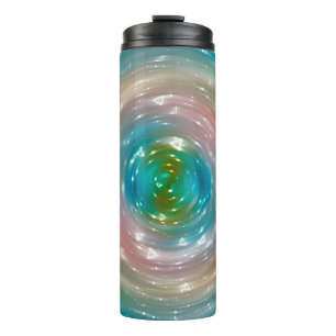 Bokeh light, shimmering blur spot lights on multic thermal tumbler