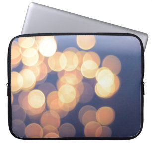 Bokeh photography of lights laptop sleeve