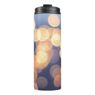 Bokeh photography of lights thermal tumbler