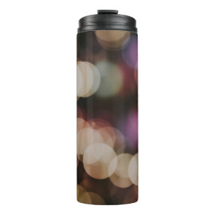Bokeh photography of lights thermal tumbler