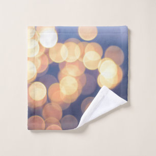 Bokeh photography of lights wash cloth