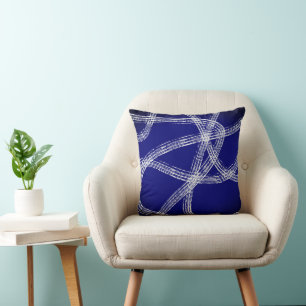 bold abstract art white lines on dark blue cushion