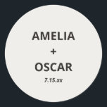 Bold Black Ivory Modern Wedding Names Date Custom Classic Round Sticker<br><div class="desc">This custom wedding sticker features a soft ivory background with bold black typography of couple's names and wedding date. Customizable with your names and date. For couples who want a clean,  minimalist,  bold wedding sticker for favors or envelope seals.</div>