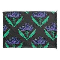 Bold blue cornflower on black