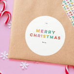 Bold Colourful Merry Christmas  Classic Round Sticker<br><div class="desc">Send your family bold,  bright and colourful Christmas greetings with this Christmas gift tag sticker. This sticker features a modern,  bold,  graphic font that will stand out and ensure smiles every time you look at it.</div>