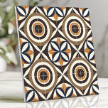 Bold Mid-Century Design with Concentric Circles Ceramic Tile<br><div class="desc">This bold mid-century modern tile features concentric circles and abstract lines in earthy brown, ochre yellow, and vintage blue tones, inspired by 1960s Scandinavian design. With its symmetrical and eye-catching layout, this tile is perfect for creating stylish backsplashes, accent walls, or retro-inspired interiors. The harmonious colour palette and geometric design...</div>